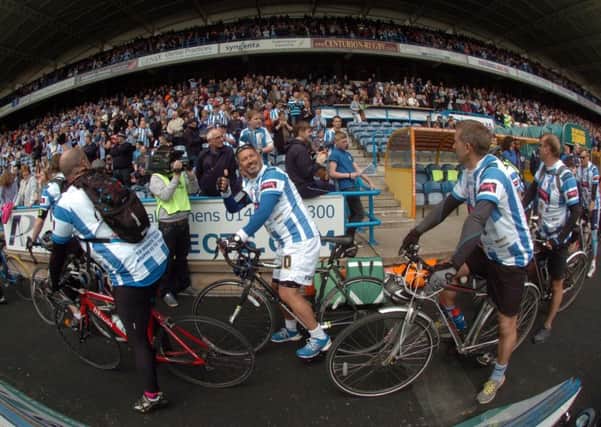 Huddersfield Town commercial director Sean Jarvis among the charity cyclists at the John Smith's Stadium.