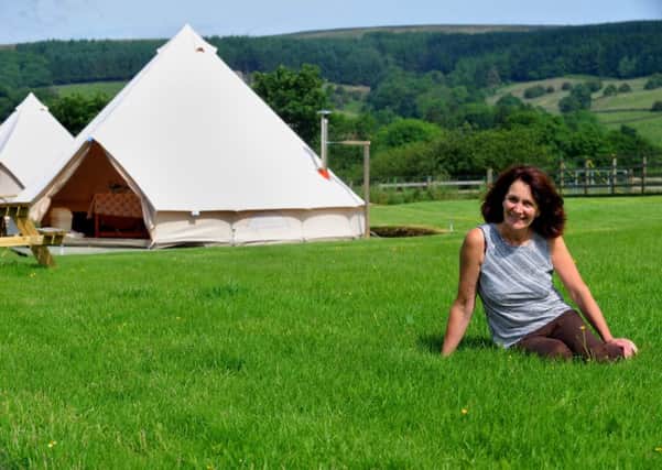 Tracy Beecroft outside the glamping tepees at Low Bell End Farm near Rosedale Abbey.