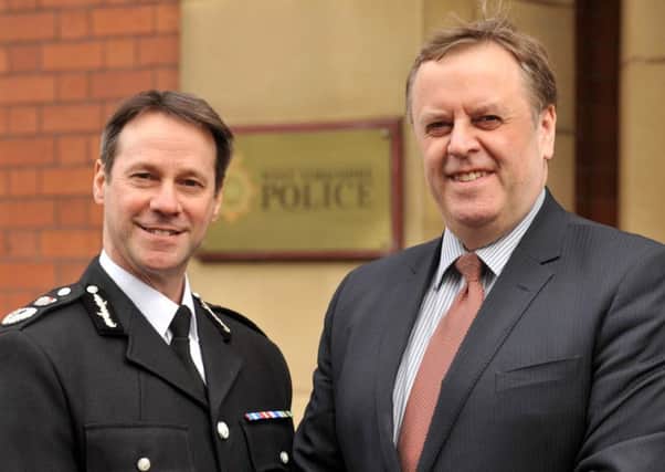 IN HAPPIER TIMES: Chief Constable of West Yorkshire, Mark Gilmore, is pictured at the force's headquarters in Wakefield on his first day in charge. Mr. Gilmore is pictured with West Yorkshire PCC, Mark Burns-Williamson. picture mike cowling april 2 2013