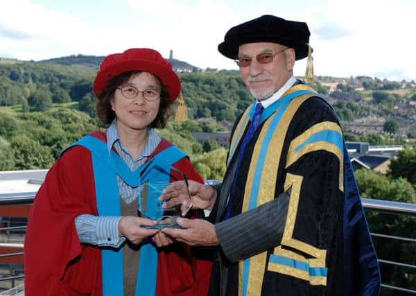 Prof Xiangqian (Jane) Jiang with Sir Patrick Stewart, former Chancellor of Huddersfield University, who presented her with the award of Fellow of the Royal Academy of Engineering in 2012.