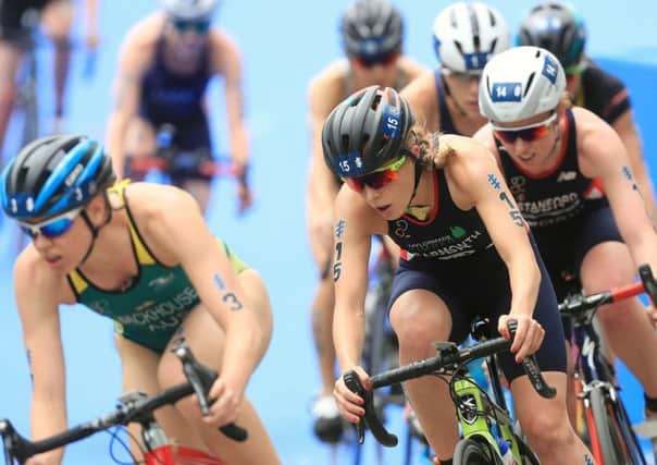 ON THE UP: Tadcaster Jess Learmonth carries the pace for Non Stanford during the bike leg during last weekends World Traiathlon Series event held in Leeds. Picture: PA