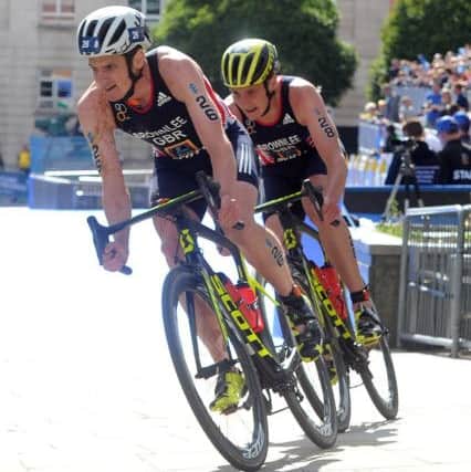 LEADING MEN: 
Jonny Brownlee leads his brother Alistair on the bike in the Elite Mens Race in the Columbia Threadneedle World Triathlon in Leeds last week. Picture: Tony Johnson.