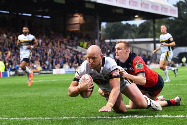 Carl Ablett scores the Rhinos' fifth try.   Picture Bruce Rollinson