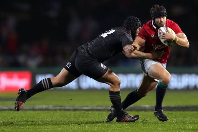 British and Irish Lions' Leigh Halfpenny is tackled during the Tour match at the Rotorua International Stadium. (Photo: PA)