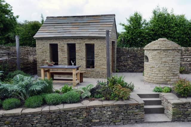 The garden room/office, pizza oven and table all handcrafted