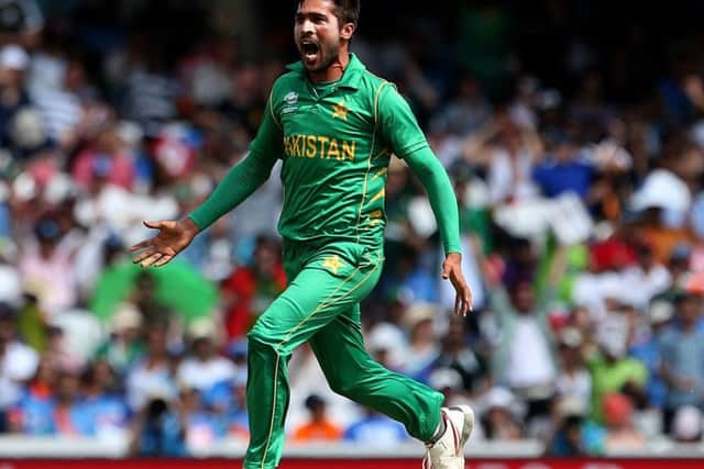 Pakistan's Muhammad Amir celebrates the wicket of India's Shikhar Dhawan (Pictures: Steven Paston/PA Wire)