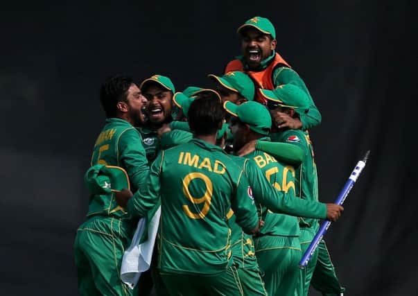 Pakistan's Sarfraz Ahmed celebrates with teammates after catching India's Jasprit Bumrah out to win the match during the ICC Champions Trophy final at The Oval, London.