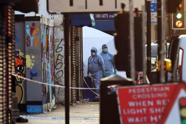 A police forensic investigators at Finsbury Park in north London, where one man has died, eight people taken to hospital and a person arrested after a van struck pedestrians. Picture: Victoria Jones/PA Wire