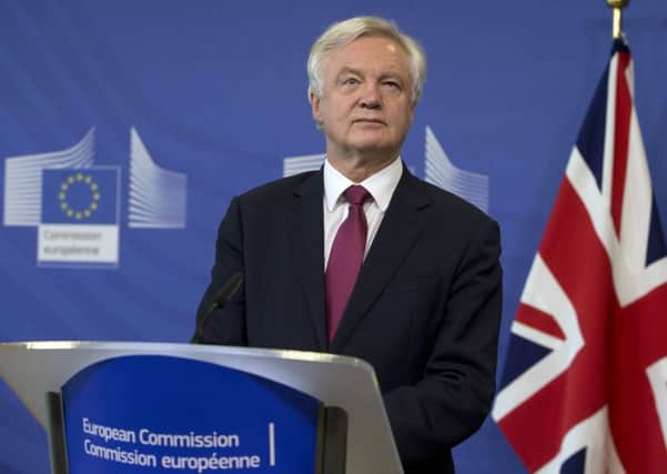 British Secretary of State David Davis makes a statement as he arrives at EU headquarters in Brussels.