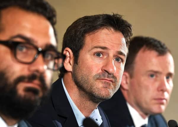 New Leeds United boss Thomas Christiansen flanked by Victor Orta  (Director of Football) and Angus Kinnear (Managing Director) (Picture: Bruce Rollinson)