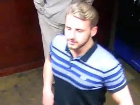 A CCTV image of the man police want to speak to