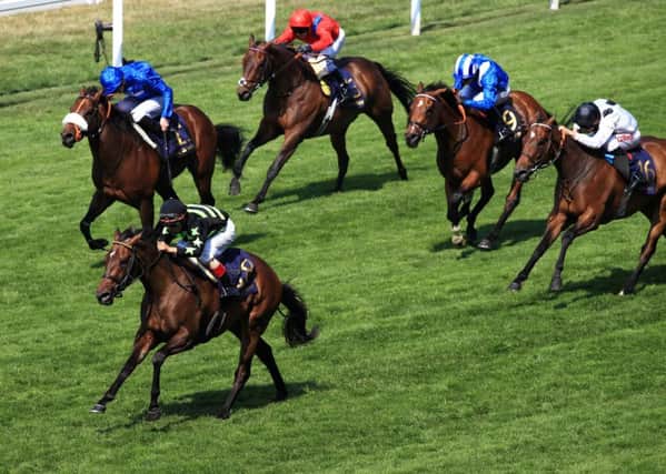 Lady Aurelia ridden by jockey John Velazquez (bottom) coming home to win the King's Stand Stakes.