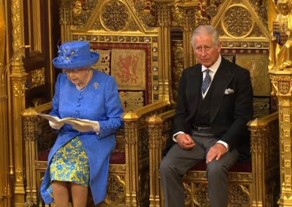 The Prince of Wales and Queen Elizabeth II delivering a pared-back Queen's Speech