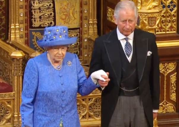 The Prince of Wales and Queen Elizabeth II during Queen's Speech in the House of Lords at the Palace of Westminster in London. Picture: PA Wire