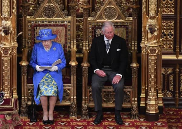 Queen Elizabeth II and the Prince of Wales in the House of Lords for the State Opening of Parliament.