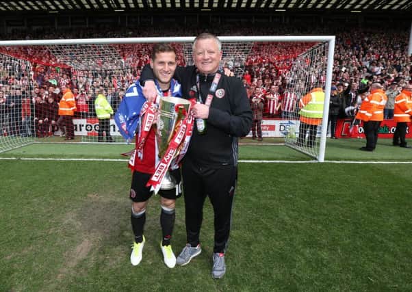 The big reveal: Chris Wilder, Billy Sharp and Sheffield United fans discovered their fixtures for the new Championship season yesterday.