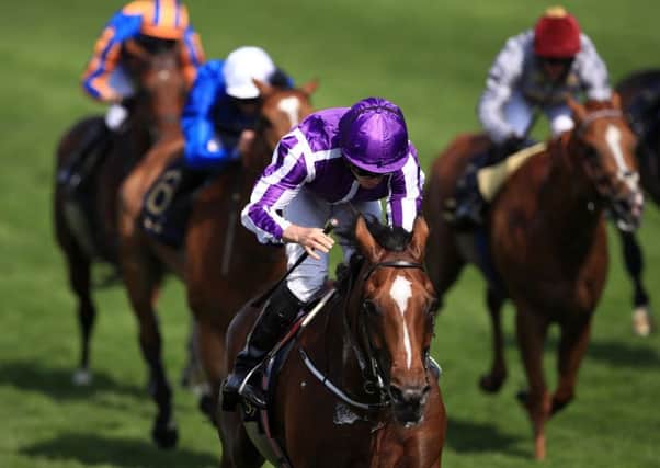 Jockey Ryan Moore on board Highland Reel wins the Prince of Wales's Stakes