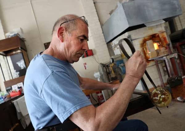 An original tenant of King Street Workshops, glassmaker David Wallace. Pictures by Bruce Rollinson.