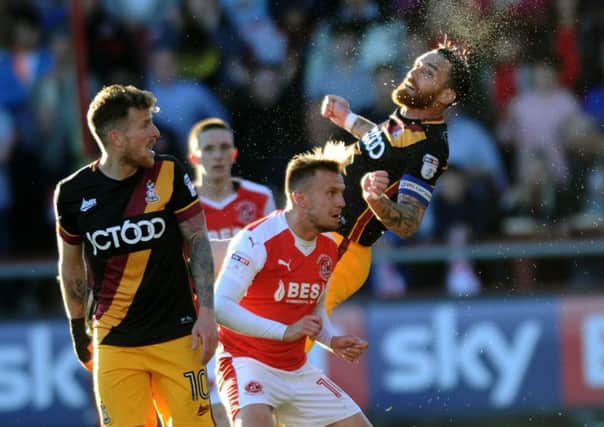 Joining Millers: Fleetwood's David Ball challenged by Romain Vincelot in the League One play-off semi-final.

Picture: Jonathan Gawthorpe