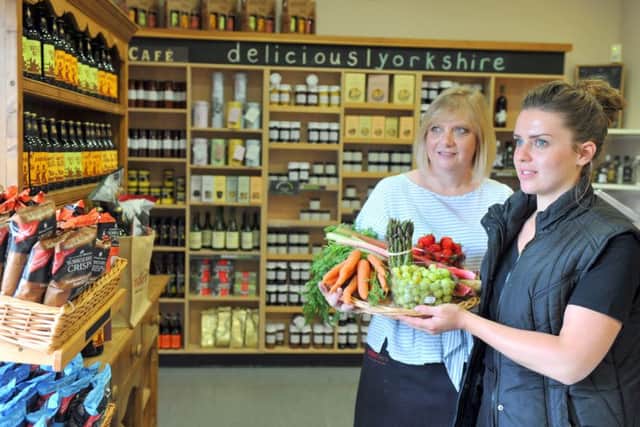 Mandy and daughter Chloe Avison with some of the fresh produce they sell in their farm shop at the Cedar Barn.