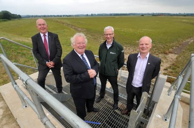 Coun Mike Thompson, portfolio holder for neighbourhoods, communities and environment with Hull City Council, Coun Stephen Parnaby, leader East Riding Council
Neil Longden, area flood coastal risk manager Yorkshire and East with the Environment Agency and Stephen Semple MD North Central Balfour Beatty at the Â£14m Willerby and Derringham Flood Alleviation scheme. Picture Tony Johnson.