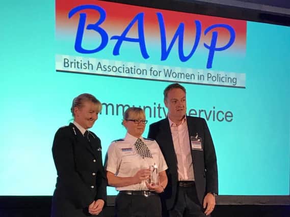 PCSO Lynne Butler, centre, with BAWP president Chief Constable Dee Collins and a representative from award sponsor Niche Technology.
