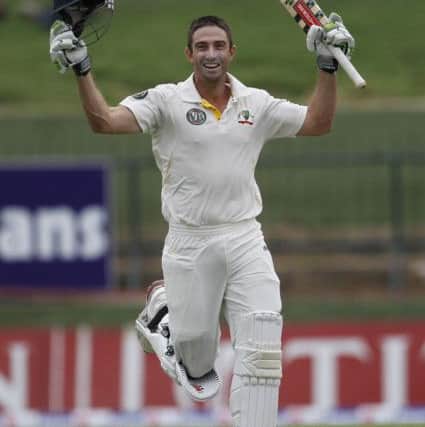 Shaun Marsh celebrates his maiden test century against Sri Lanka in Pallekele in September 2011. Picture: AP/Eranga Jayawardena