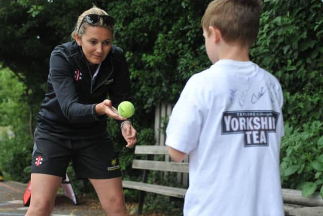 Catch: Former England cricketer Charlotte Edwards helping out with Yorkshire Tea National Cricket Week at Spofforth Cricket Club.  
Picture Tony Johnson