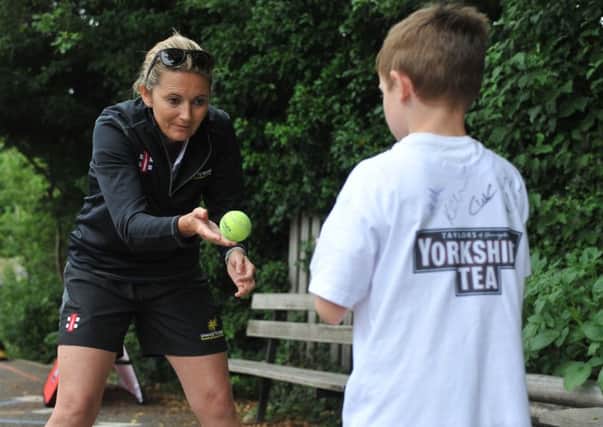 Catch: Former England cricketer Charlotte Edwards helping out with Yorkshire Tea National Cricket Week at Spofforth Cricket Club.  
Picture Tony Johnson
