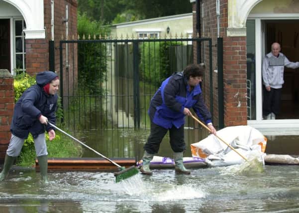 Householders began the big clean-up after floods on Boothferry Road, Hull. Picture: Terry Carrott