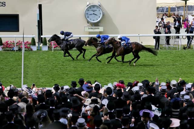 Caravaggio, ridden by jockey Ryan Moore, wins the Commonwealth Cup on day four of Royal Ascot. Picture: Brian Lawless/PA