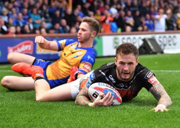 Zak Hardaker dives over for the Tigers' third try.  Picture Bruce Rollinson