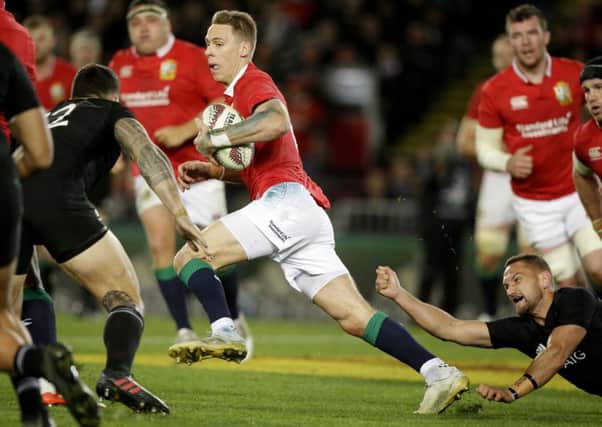 Flier: British and Irish Lions' Liam Williams makes a scintillating run during the first Test.
Picture: AP Photo/Mark Baker