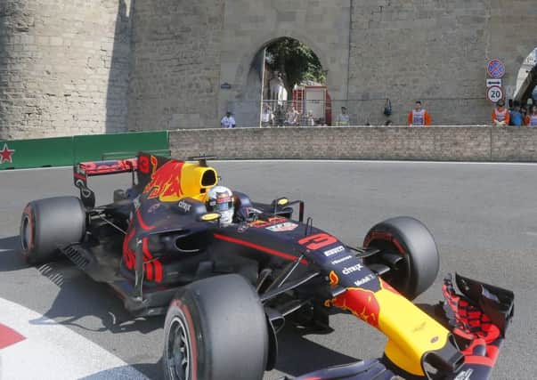 Eventual winner Daniel Ricciardo steers his Red Bull car around the Baku circuit during yesterdays Azerbaijan Grand Prix (Picture: Efrem Lukatsky/AP).