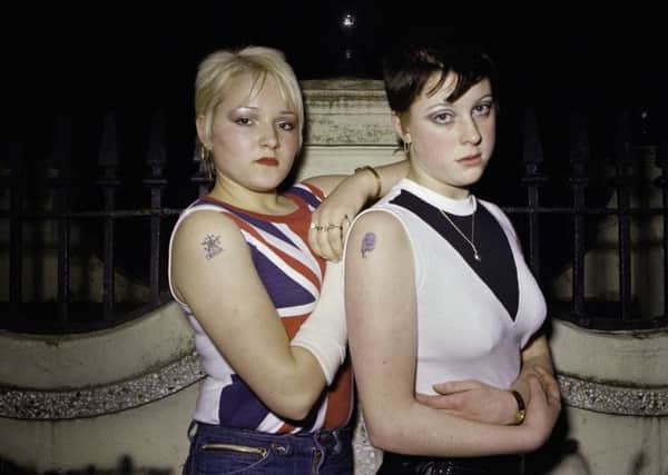 Carrie Kirkpatrick and Gill Soper outside the toilets in Crystal Palace London in November 1980.