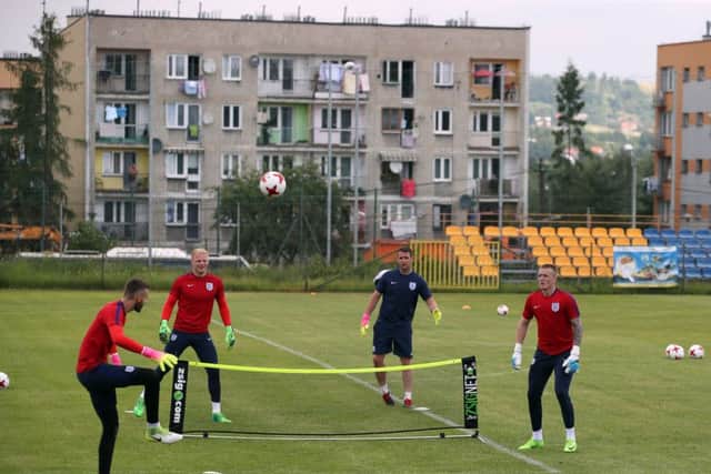 England Under 21's goalkeepers Jordan Pickford, Angus Gunn and Jonathan Mitchell during the training session at Gminny Stadion Sportowy, Krakow. Picture: Nick Potts/PA