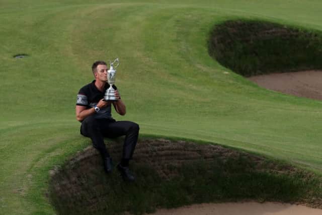 Sweden's Henrik Stenson celebrates with the Claret Jug after winning the Open Championship last year (Picture: Peter Byrne/PA Wire).