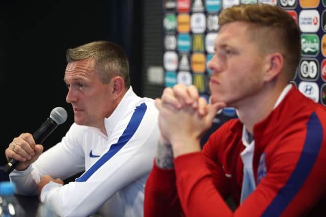 England U21 manager Aidy Boothroyd (left) and Alfie Mawson during the press conference at Cracovia Stadium, Krakow. Picture: Nick Potts/PA