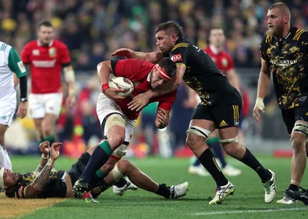 British and Irish Lions' CJ Stander is tackled during the tour match at the Westpac Stadium, Wellington. Picture: David Davies/PA