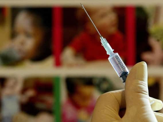 A vaccination syringe as a patch has been developed which could replace traditional flu jabs. Picture: Gareth Fuller/PA Wire