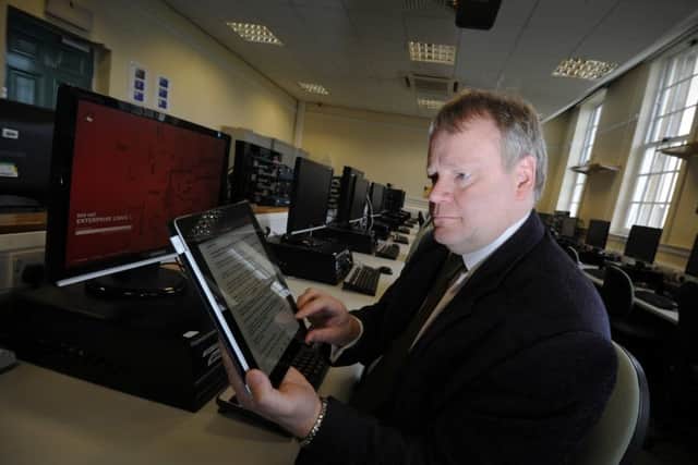 Prof Colin Pattinson pictured with his ipad, researching 4g technology, Caedmon Hall, Headingley.....18th April 2012 Picture by Simon Hulme