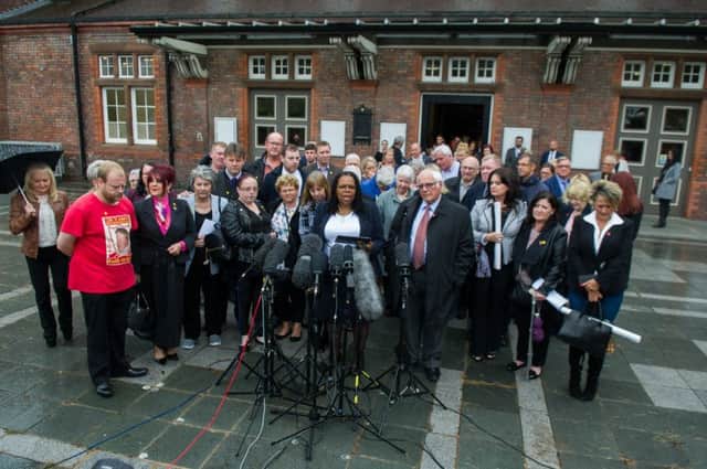Prosecution Service (CPS) announcement held at Parr Hall, Warrington, regarding its charging decisions in relation to the Hillsborough disaster where 96 victims lost their lives.
Pictured Solicitor Marcia Willis-Stewart, speaking to the media alongside Trevor Hicks.