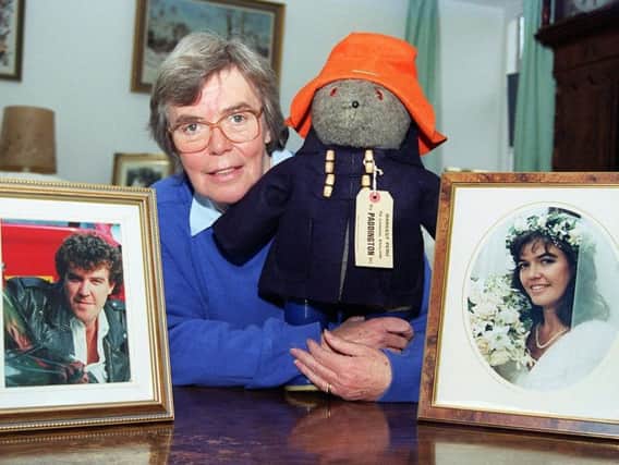 Shirley Clarkson with Paddington and photos of her children, Jeremy and Joanna.