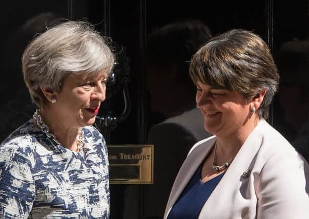 DUP leader Arlene Foster (right) with Theresa May