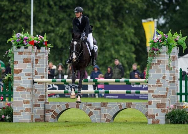 FUTURE STAR:  Emily King and Cooley Currency glide over a fence in the CIC three-star class at this year's Equi-Trek Bramham International Horse Trials. Picture by James Hardisty.