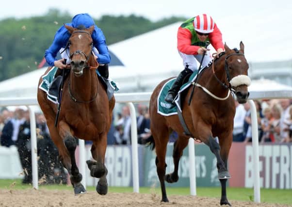 Antiquarium ridden by James McDonald (left) beats Seamour ridden by Ben Curtis to win the John Smith's Northumberland Plate