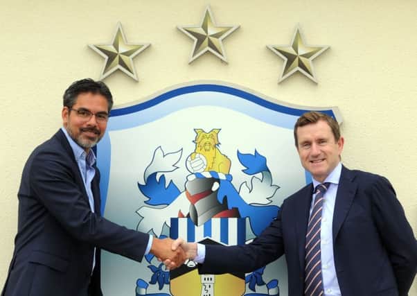 Huddersfield Town head coach David Wagner after signing a new deal with chairman Dean Hoyle (Picture: Jonathan Gawthorpe).