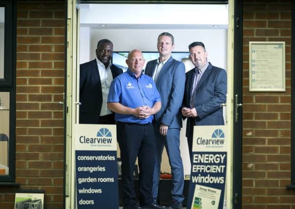 36973  CONSERVATORY OUTLET   30/6/17

Clearview Home Improvements , Preston.
L-R Mick Giscombe , MD of  Conservatory Outlet Ltd , Andy Ross , installations director with Clearview , Greg Kane , CEO Conservatory Outlet Group and Chris Mitchell  MD of Clearview.

Picture by Chris Bull / UNP