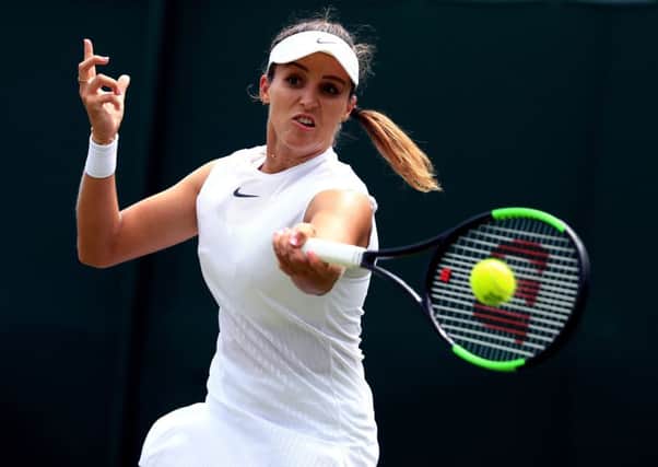 Laura Robson in action on her way to defeat against Beatriz Haddad Maia on day one at Wimbledon. Picture: John Walton/PA