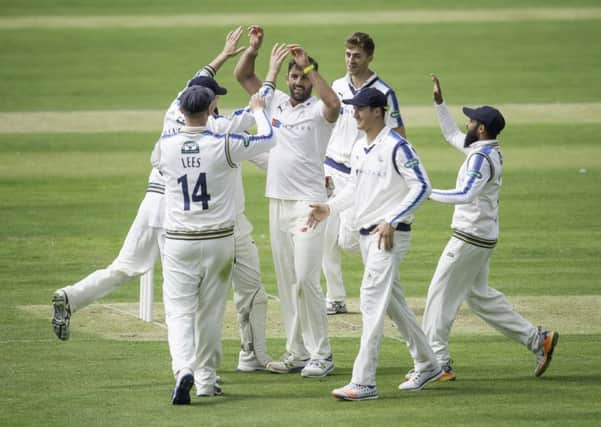 Liam Plunkett, in his first County Championship match since last September, is congratulated after dismissing Somersets Tom Rouse (Picture: Allan McKenzie/SWpix.com).